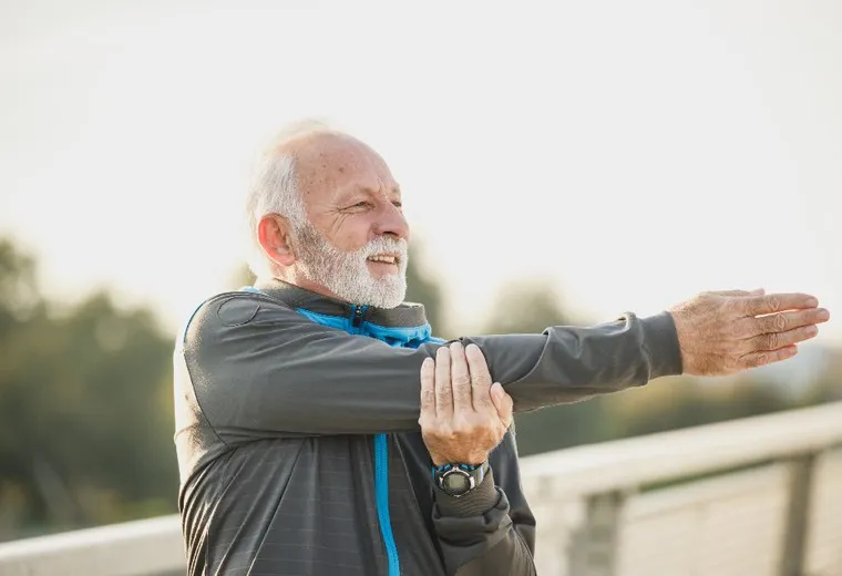 Physiotherapist treating a patient’s neck during a back and neck pain session